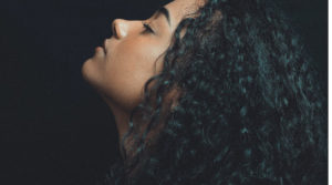 https://www.pexels.com/photo/close-up-photo-of-woman-with-curly-hair-2123778/