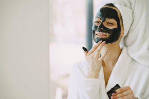 https://www.pexels.com/photo/photo-of-woman-applying-clay-mask-on-her-face-4148921/