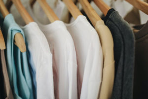 https://www.pexels.com/photo/white-long-sleeves-shirts-on-brown-wooden-clothes-hanger-3735641/